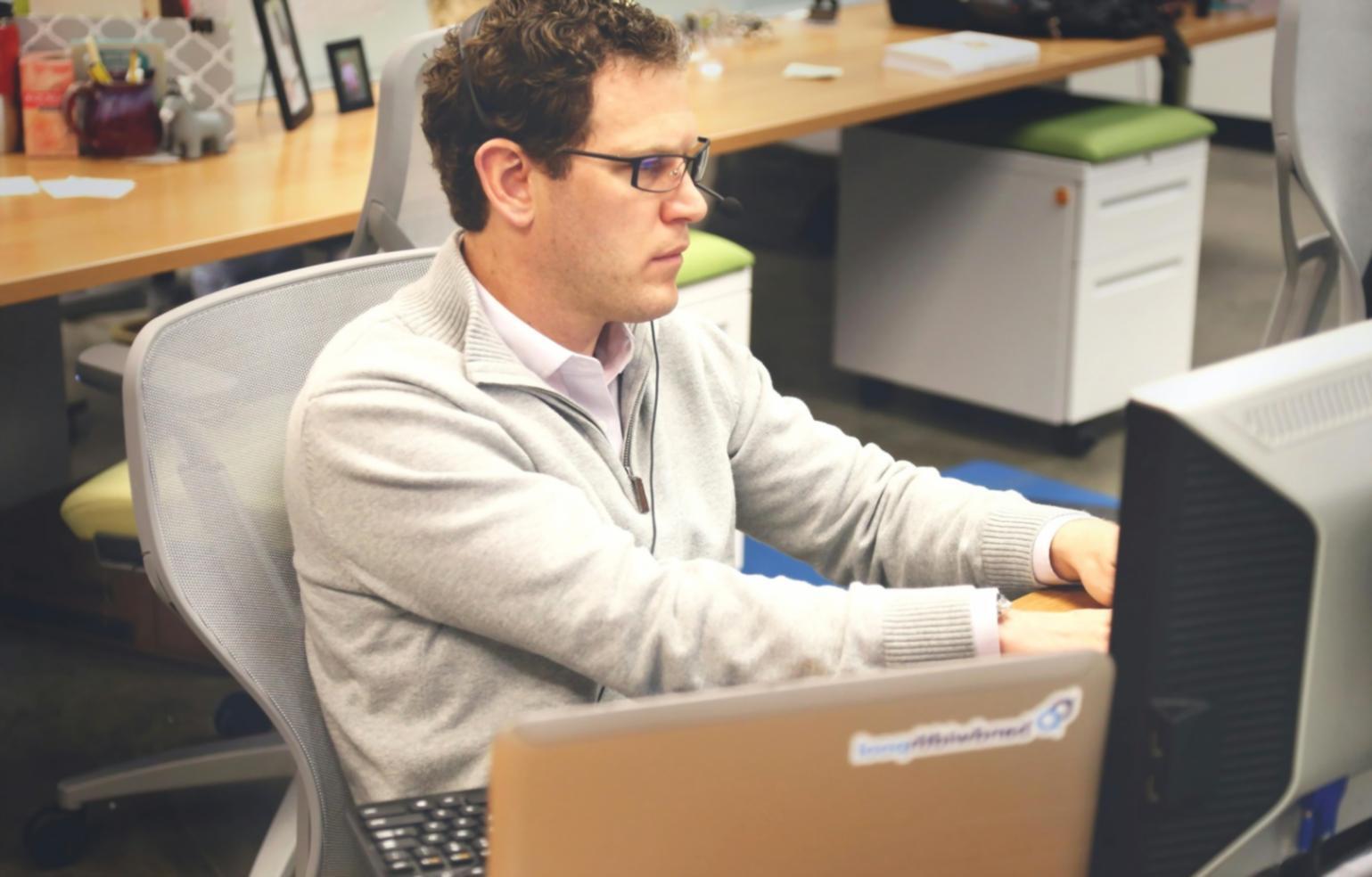 Close-up of mobile device testing setup with multiple screen configurations